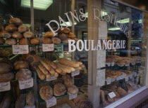 Boulogne.  Boulangerie in Haute Ville  part view of exterior with window filled with breads and cakes.