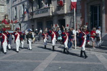 Saint Tropez. Bravade Festival with men in costume marching in a procession Celebrated anually on June the 15th Bravade meaning act of defiance