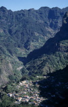 Curral das Freiras. View over the valley with partially forested mountains encircling the village Nuns Refuge. Nuns fled here from pirates in 1566
