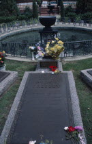 Graceland. Grave of Elivs Presley decorated with flowers