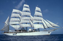 Sea Cloud tall ship with white sails built in 1931 with twenty nine sails covering over thirty five thousand square feet.