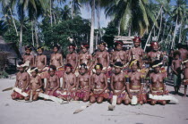 Kaileuna Island. Female dancers in costume greeting visitors