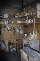 Cape Royds. Interior of Shackletons Hut built in 1908 with shelves of rusty tinned food containers