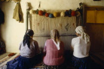 Women near Konya weaving carpets in traditional way using hand loom.Eurasiacrafts  textiles