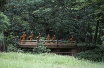 Buddhist monks on morning alms round.