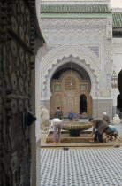 Men washing before entering mosque. Moslem