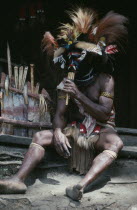 Paya or traditional healer sitting down