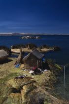 Reed houses on floating islands built by the Uros people.