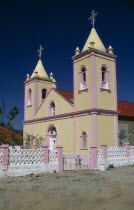 Yellow and pink painted church