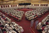 The Stock Exchange interior with traders at banks of computers