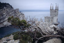The Swallows Nest. Small castle with high tower built on a cliff edge over the sea