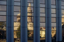 Fishermen s Bastion reflected in the windows of the Hilton Hotel