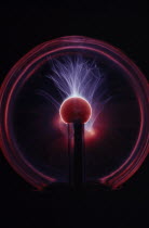 Electrical discharge through rare gasses contained in a glass sphere