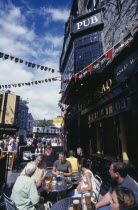 People sitting outside Kings Head pub on Quay Street  Republic of Ireland