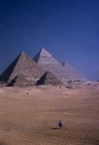 The Pyramids with man on mule in foreground