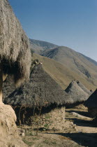 Grass thatched dwellings of San Miguel  with sacred pots at roof apices Indigenous TribesCaribbean coast of Colombia. American Colombian South America West Indies Columbia Hispanic Indegent Latin Am...