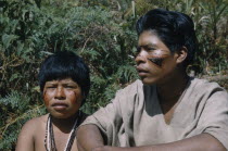 Gabriel and his wife with bright red  ochote  facial paint extracted from ground ochote seeds and black fungal facial paint. Indigenous TribesAmerican Colombian South America Columbia Hispanic Indeg...