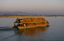 Boat full of clay pots on the Irrawaddy River between Mandalay and Mingun. Burma