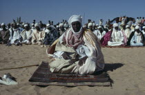 Muslim chief at prayer during festival. Moslem