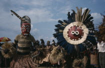 Bapende tribe masked dancers at Gungu festival. Zaire