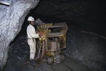 Miner working underground in the Metallon Gold Zimbabwe Arcturus gold mine.Established 1907