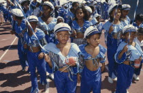 Children in costumes and face paint taking part in Cape Coon New Year carnival parade at Green Point Stadium.Minstrel Carnival