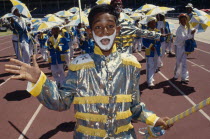 Young boy in costume and face paint taking part in Cape Coon New Year carnival parade at Green Point Stadium.Minstrel Carnival