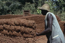 Building mud brick house.