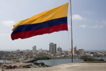 View of the city from the fortress of San Felipe  with Colombian flag in foreground.