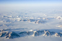 Aerial view at sunset  including snow covered peaks