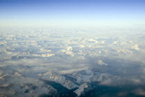 Aerial view at sunset  including snow covered peaks