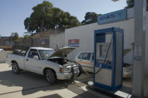 Pickup truck being filled up with natural gas at a petrol station  Brasil Gasoline Lorry
