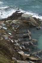 View down on a natural harbour for traditional oar propelled fishing boats  Arraial do Cabo. Brasil