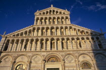 Duomo.  Pisan-Romanesque four tiered exterior facade.