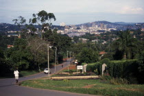 Wealthy city suburbs with high rise city buildings beyond.