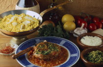 Ossobucco  a dish of braised shin of veal with risotto alla milanese. rice