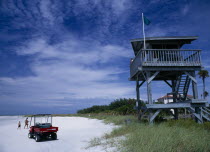 Lido Beach. Lifeguard Hut with Green Flag overlooking sandy beach with a buggy
