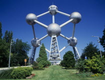 The Atomium and garden. There are nine steel spheres  housing exhibition spaces and a restaurant  connected via tubes with escalators.