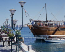 Corniche. Restaurant Dhow by seam moored boats  United Arab Emirates