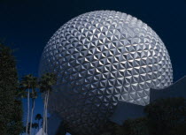 Walt Disney Epcot Centre. Spaceship Earth surrounded by Palm Trees. **Editorial Use Only**