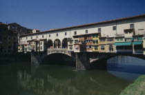 The Ponte Veccio  Old Bridge  with shops  mainly jewellers  built along it.Vecchio
