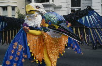 Notting Hill Carnival  dancers in Eagle and Kingfisher costumes.