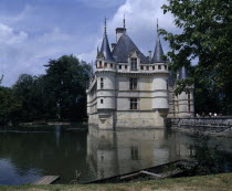 Azay Le Rideau Chateau and Water filled Moat Bridge Boat Moared On Bank In Foreground
