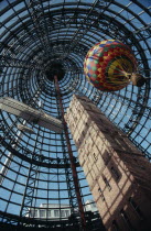 Looking up at the old Shot Tower  hot air balloon and bi-plane inside Melbourne shopping centre. Center