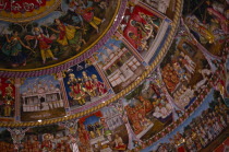 Ceiling painting and relief carving in the Swaminarayan Temple.