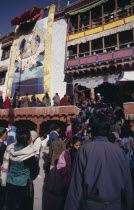 Pilgrims wait to see Holy Thangka of Padmasambhava revealed once in twelve years during the Hemis Festival to celebrate the birth of the founder of Tibetan Buddhism.Thanka - rectangular Tibetan paint...