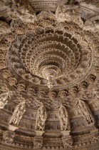 Dilwara Temples. Vimal Vasahi Jain temple 1031 A.D. Detail of carved white marble central ceiling with central pendant tapered to form point like a lotus flower.