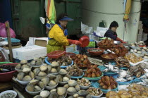 Seafood vendor at Jagalchi Market  the largest fish market in KoreaAsia  South Korea  fish  market  seafood