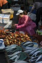 Seafood vendor at Jagalchi Market  the largest fish market in KoreaAsia  South Korea  fish  market  seafood