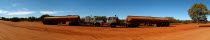 Panorama of rusting tankers on redut dust dirt road.Antipodean Aussie Australian Oceania Oz
